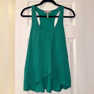 Teal tank with navy details. See second picture for design
